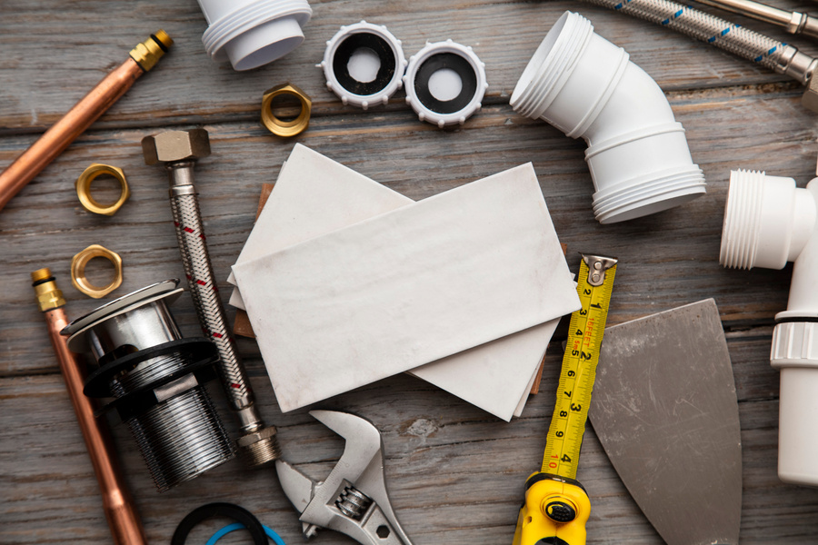 Plumbing Tools and Tiles. Home Improvement Background